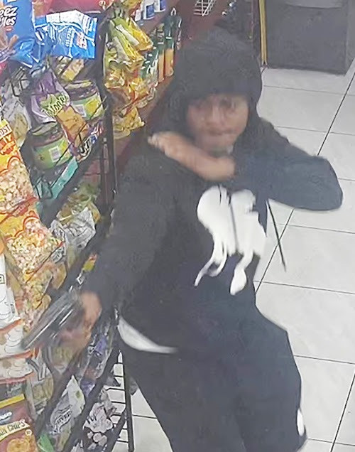 pistolero a bodega en El Bronx large