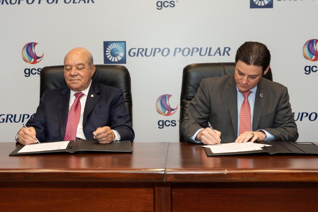 Grupo Popular adquiere GCS International Manuel E. Jimenez F. y Manuel Alejandro Grullon Hernandez