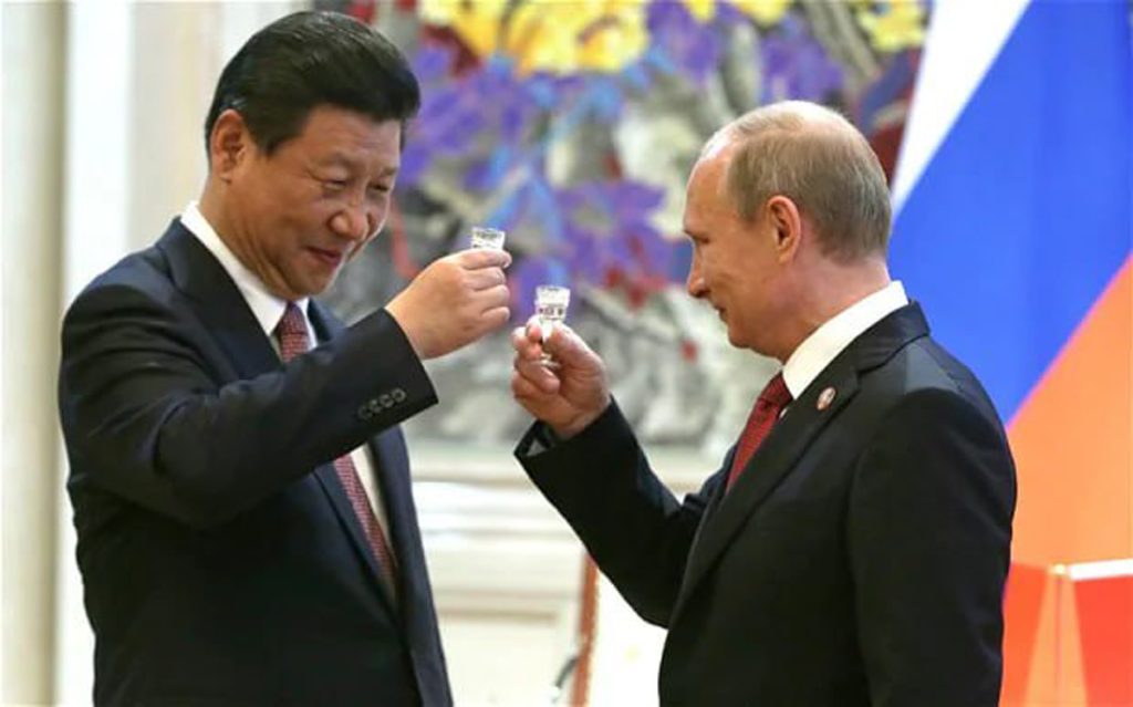 Vladimir Putin con Xi Jinping eljacaguero