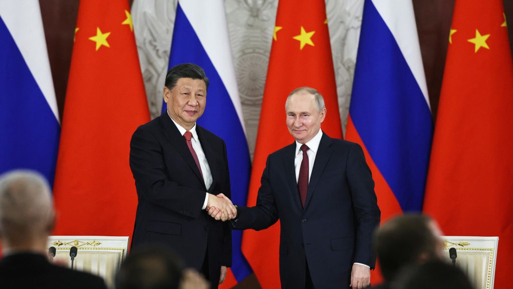 Vladimir Putin y el lider chino Xi Jinping