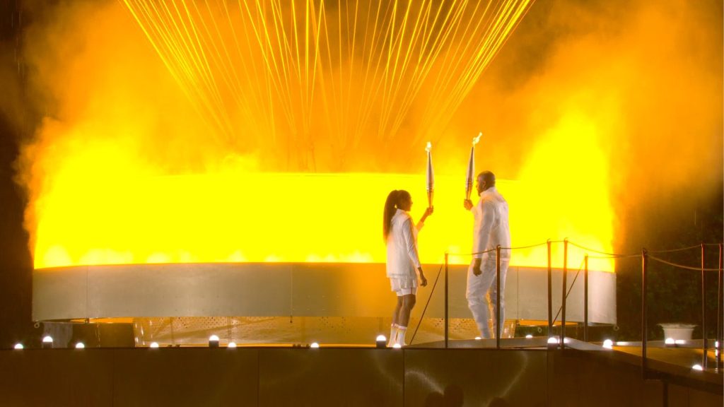 encendio la llama olimpica con la fabulosa voz de Celine Dion de fondo